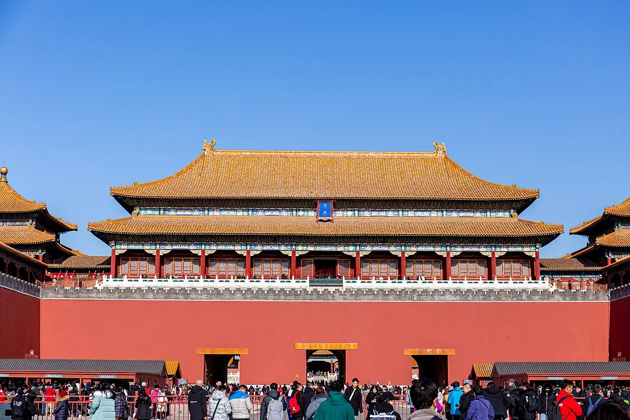 Visitors approaching the Meridian Gate of the Forbidden City in Beijing
