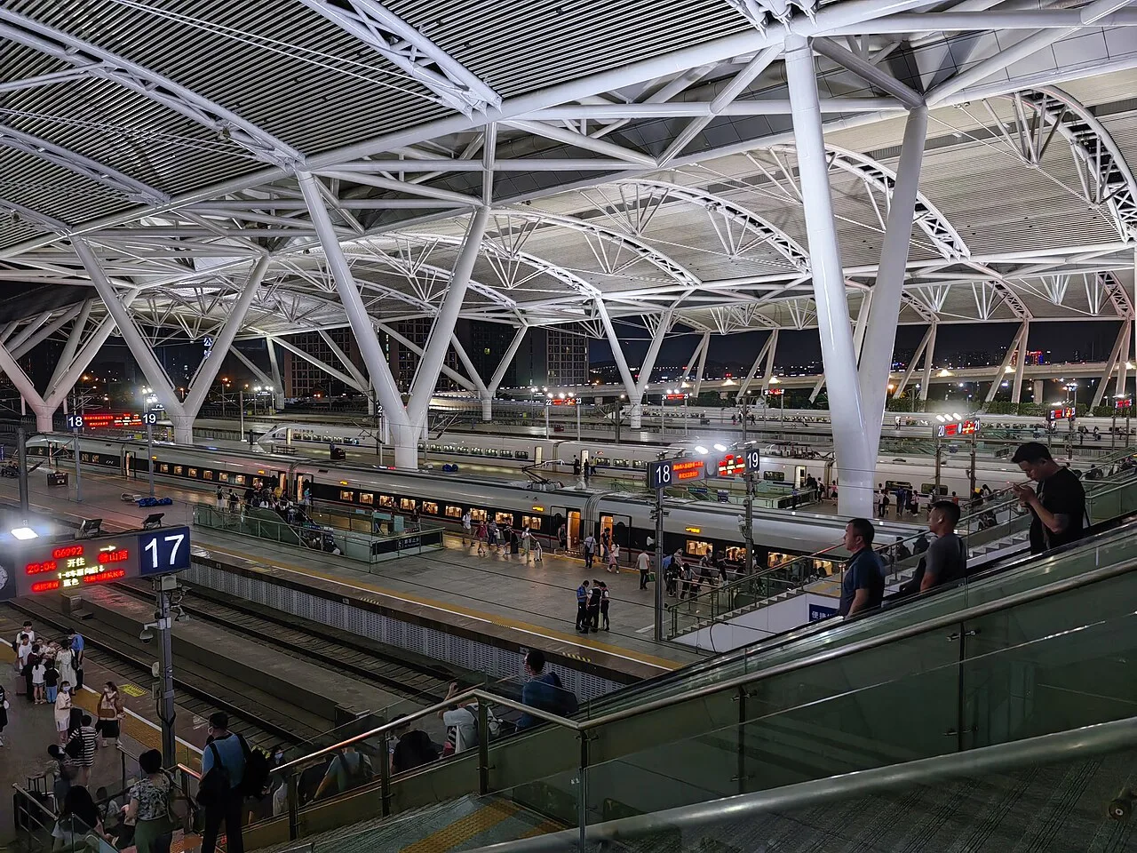 A train platform at Guangzhou South Railway Station at night