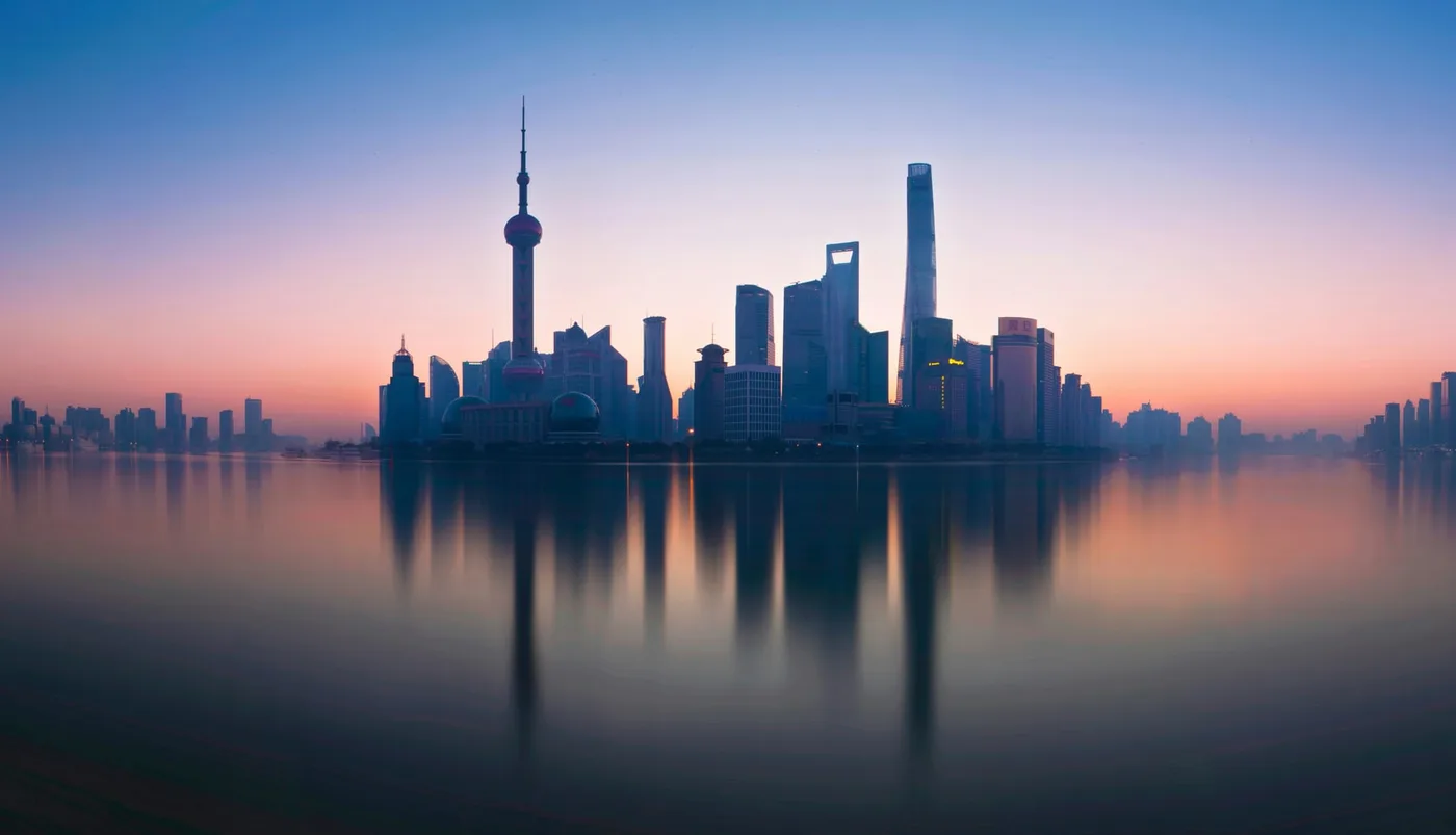 Lujiazui skyline reflecting in the Huangpu River from the Bund in Shanghai