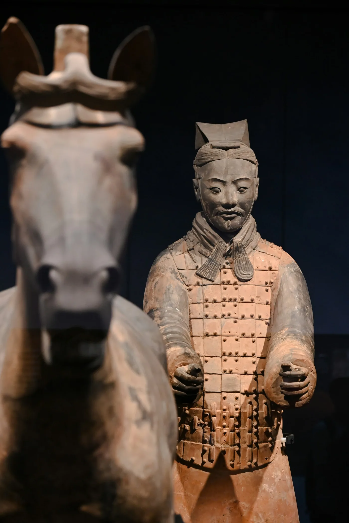 Rows of ancient terracotta warrior and horse statues in Xi'an's museum